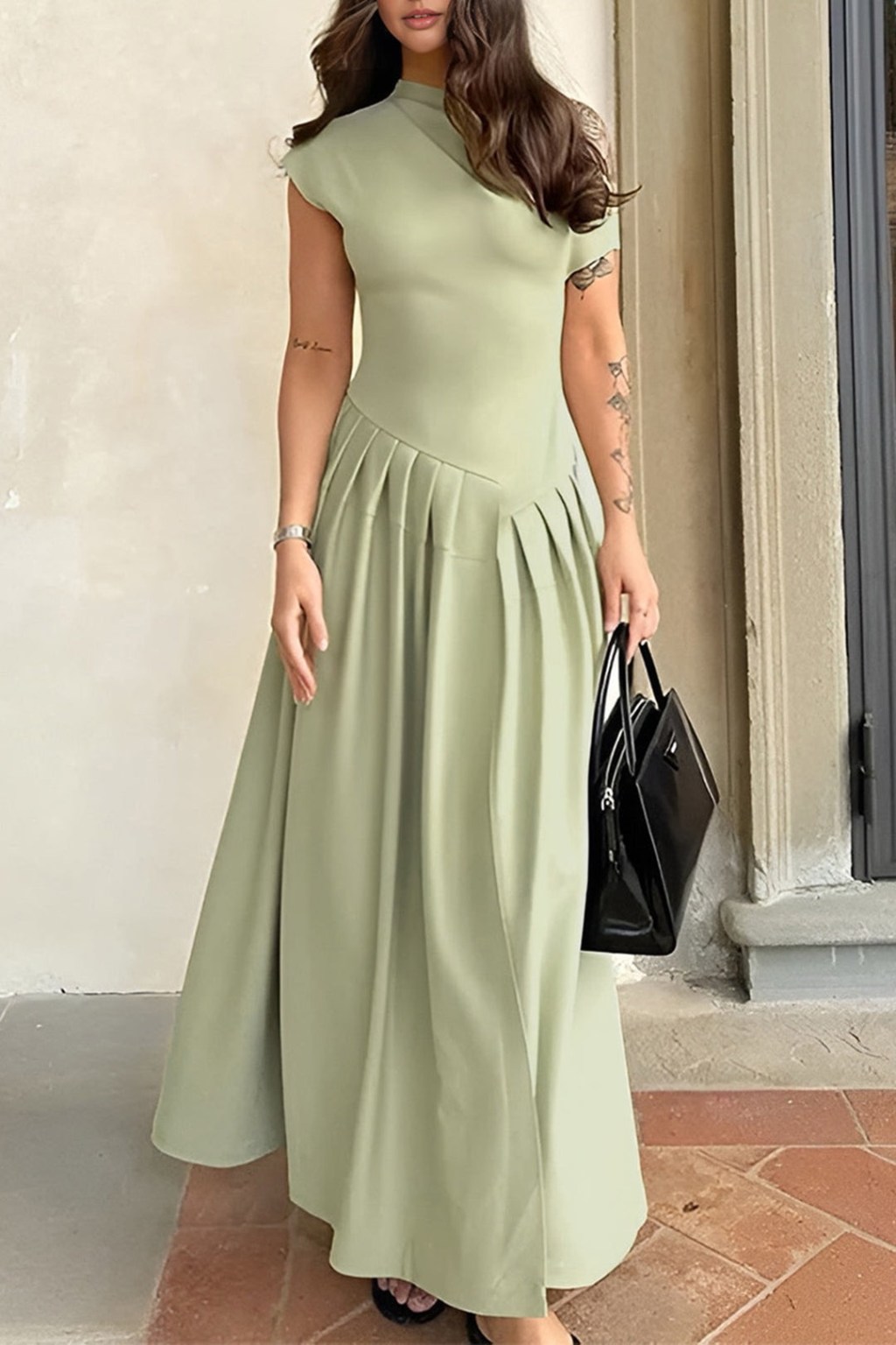 Elegance in Every Fold: Solid Pleated Maxi Dress by&nbsp;Micas